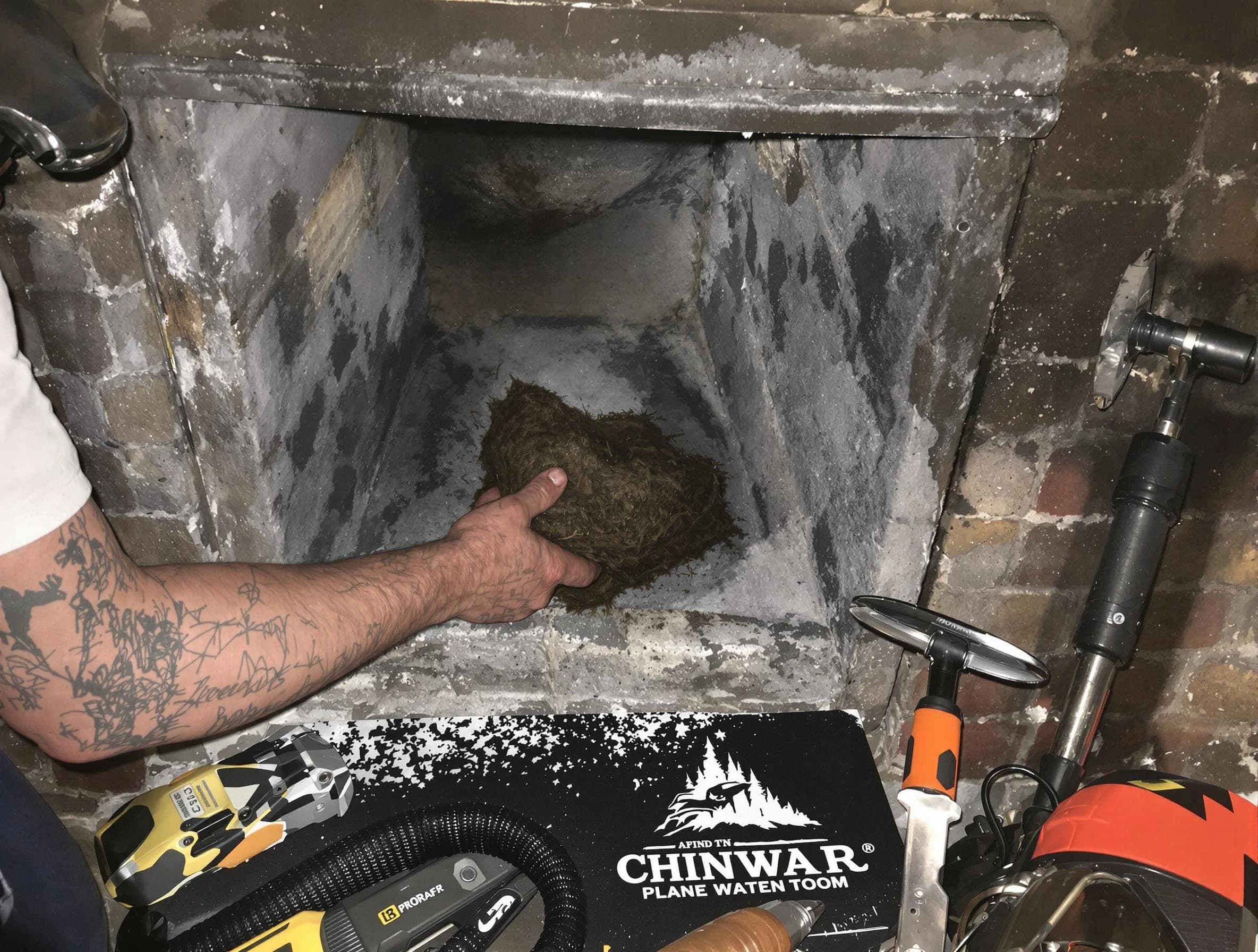 Andover Chimney Sweep safely removing debris and screening chimney in Andover, MA